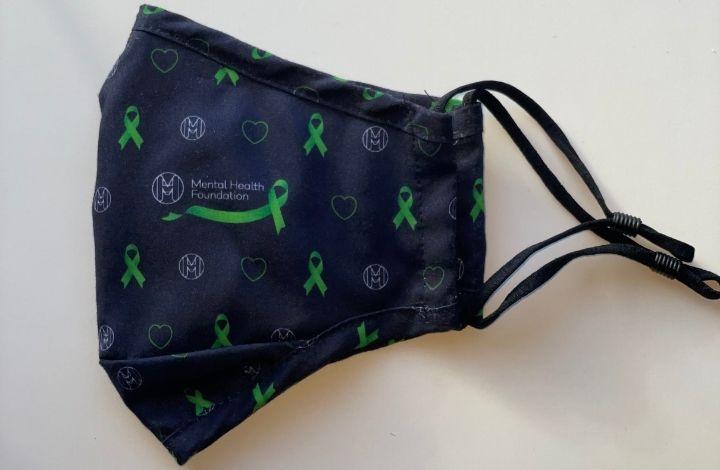 Photo of a green ribbon face mask