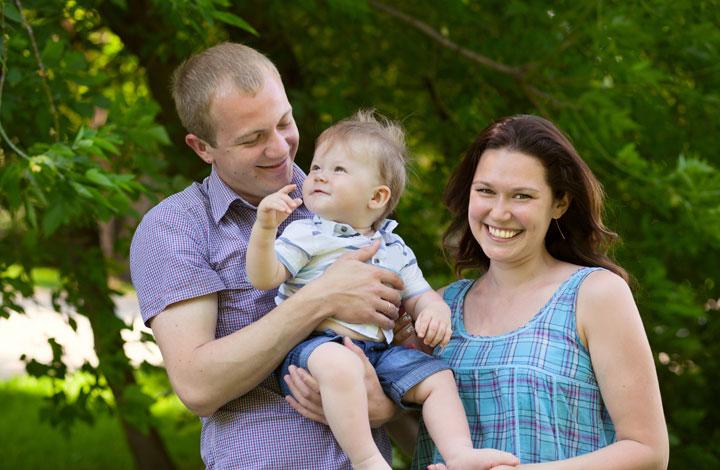 Father, baby and mother