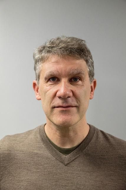 Portrait photo of Lee Knifton in a jumper