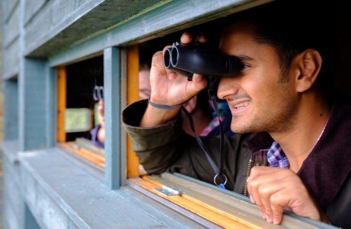 Man with binoculars