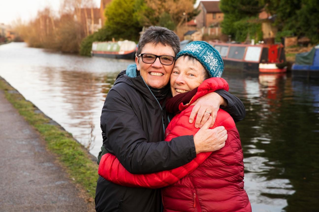 Older couple outside on the river