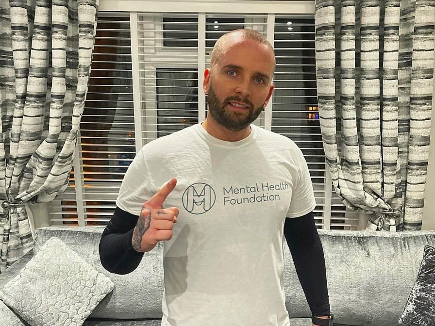 Photo of Taylor in a Mental Health Foundation tshirt