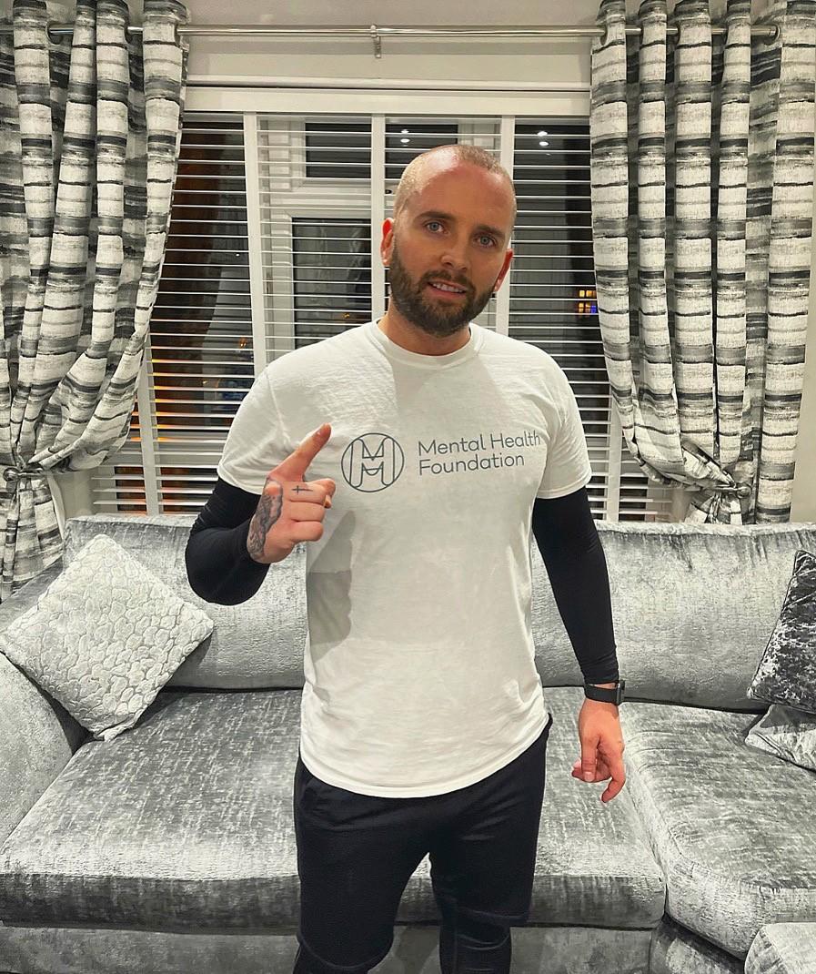 Photo of Taylor in a Mental Health Foundation tshirt