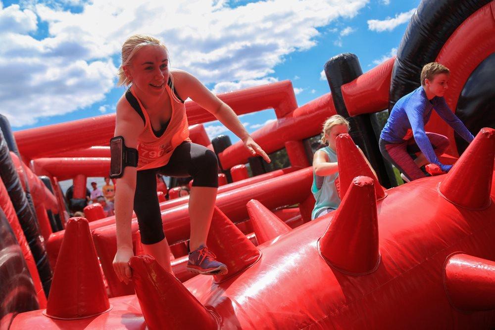 Woman on an inflatable bouncing castle
