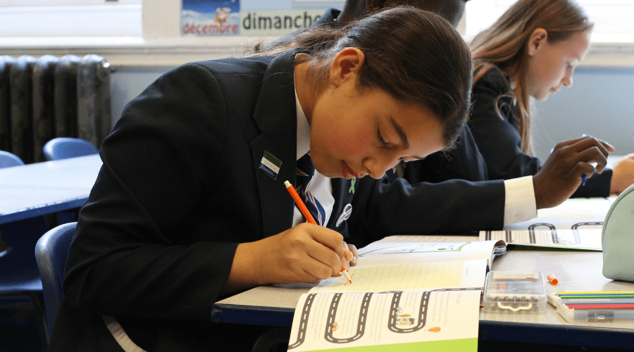 School girl writing