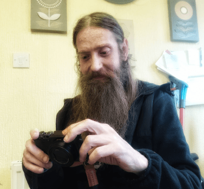 Tim holding his camera